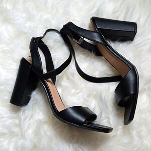 Another pair of black heels